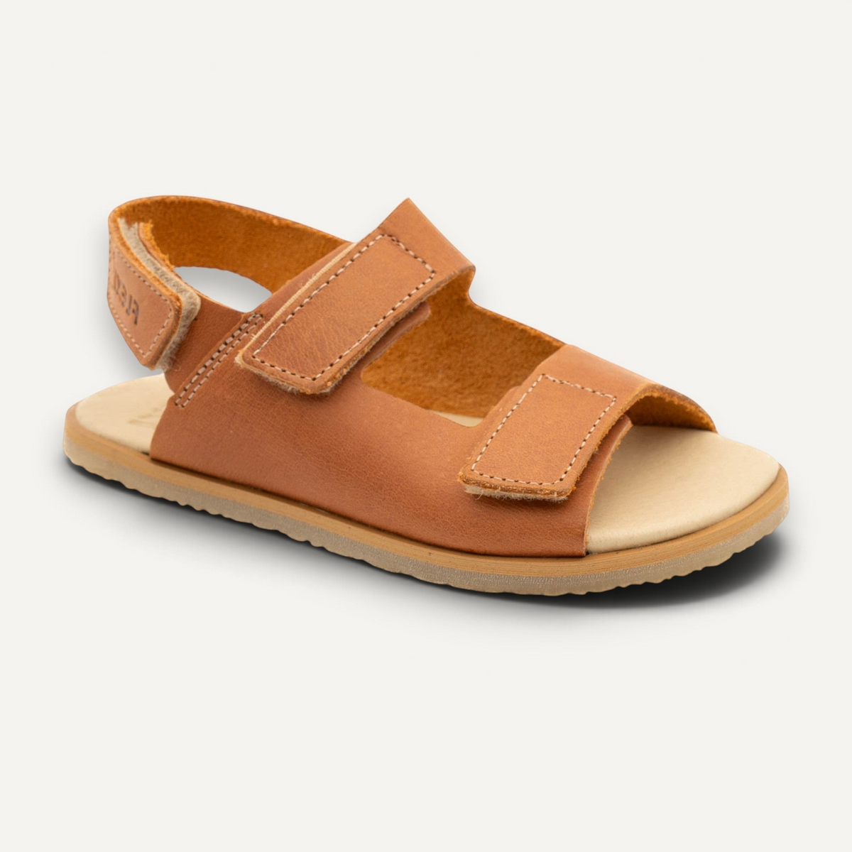 Sandalia barefoot zoireo FlexiNens en color melocotón con cierre de velcro y suela flexible para niños