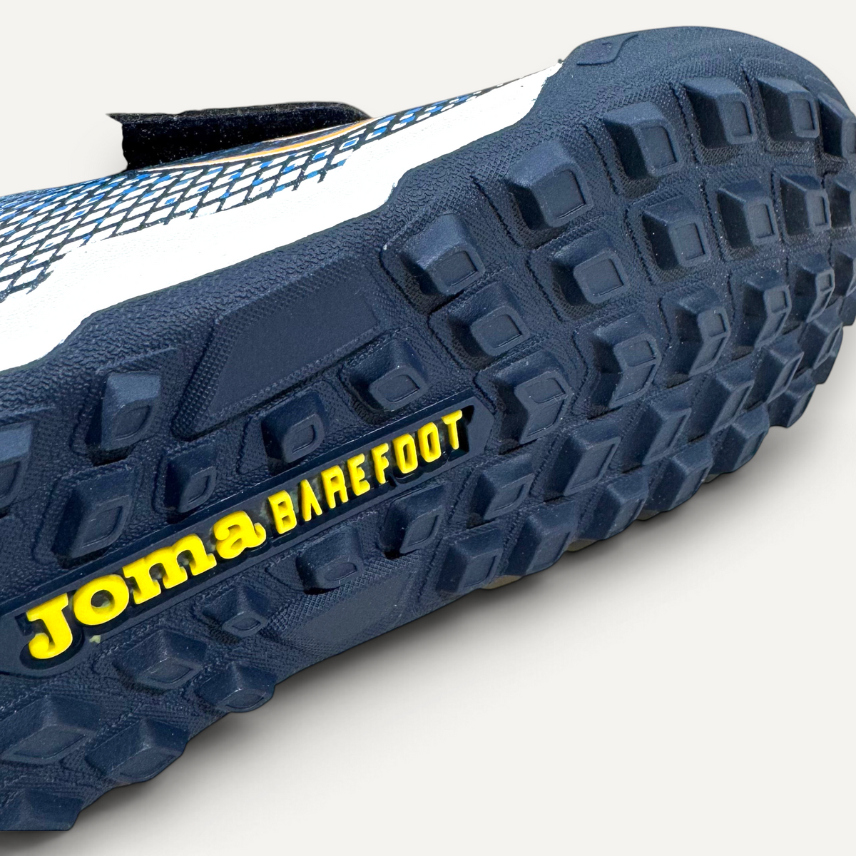 Suela multitaco azul marino de la bota de fútbol infantil Joma Barefoot Gol de zoireo para césped artificial